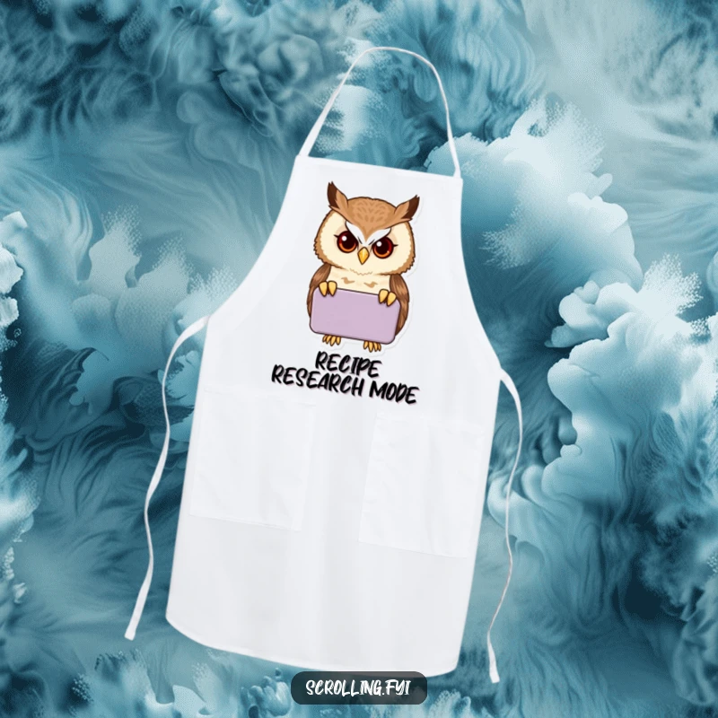 Funny proud owl peering intently into a handheld device on a protective and humorous apron.
