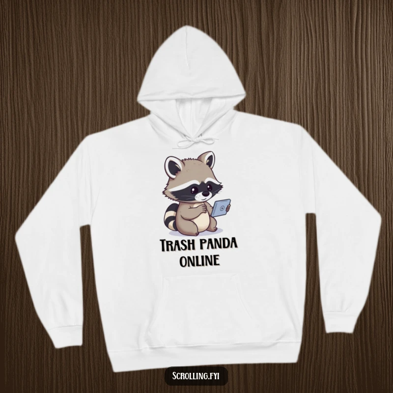 Funny hoodie showing a fascinated raccoon absorbed in a small screen, radiating a humorous and cozy vibe.