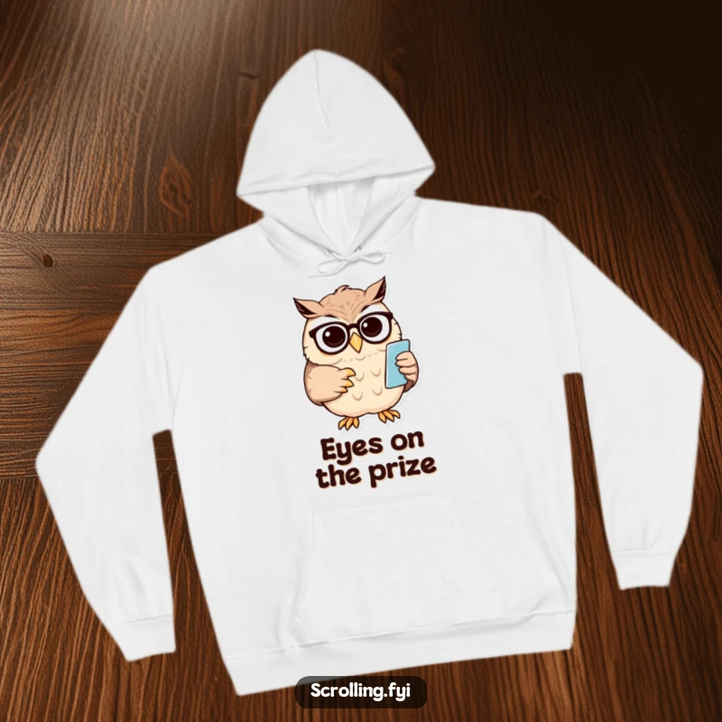 Funny owl hoodie with a wise owl squinting and adjusting spectacles to view a small mobile phone screen.