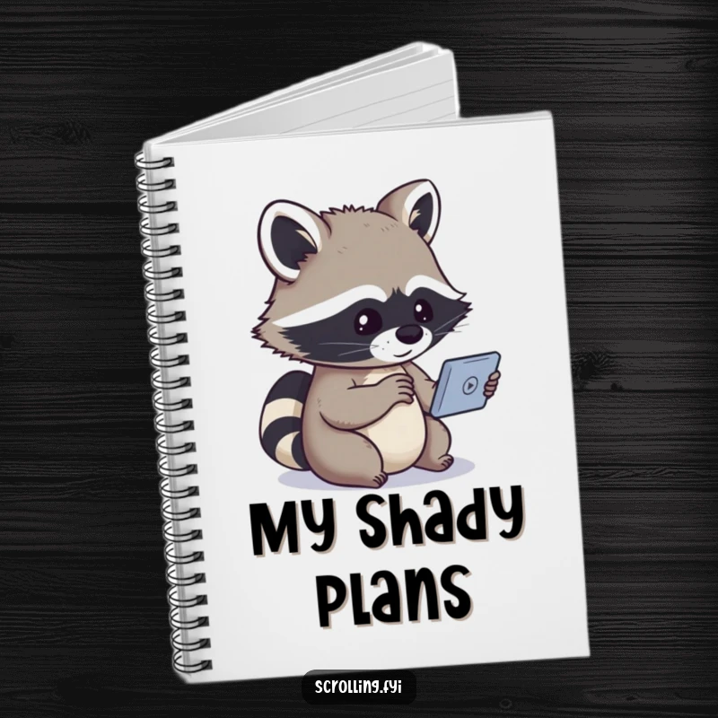 Funny notebook showing a curious raccoon focused on a small screen, symbolizing humorous idea capture.